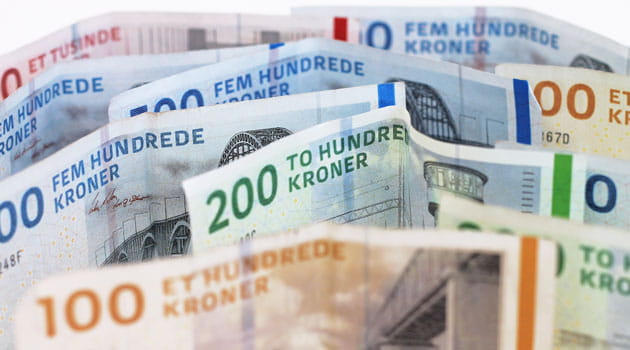 Bundt pengesedler, der står på kanten.