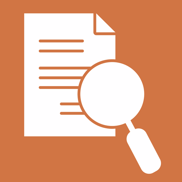 Illustration af lup, der ligger over papir